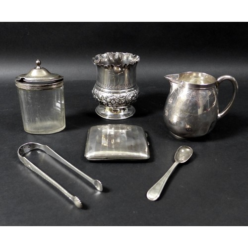 74 - A group of five silver items, comprising a pair of George III Irish silver tongs, with bright cut en... 