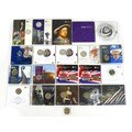 A collection of twenty one uncirculated £5 coins, twenty of which are in Royal Mint commemorative sl... 