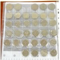 A UK decimal coins album, including an uncirculated 2009 Kew Gardens 50p, a full collection of twent... 