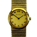 A Bueche-Girod 18ct gold lady's wristwatch, circa 1966, the circular gold dial with black Arabic num... 