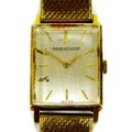 A Jaeger LeCoultre 18ct gold cased gentleman’s wristwatch, circa 1966, the rectangular brushed silve... 