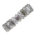 An 18ct white gold and diamond ring, five baguette cut stones, each 5.1 by 2.3 by 1.6mm, 0.17ct, set... 