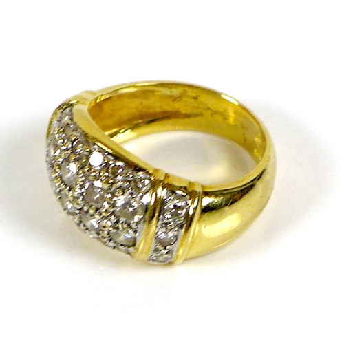 228 - A gold bombe cocktail ring, inset with some diamonds and other white stones, size J, indistinctly ma... 