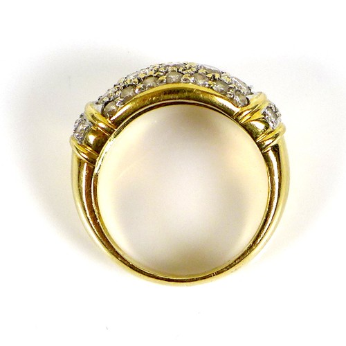 228 - A gold bombe cocktail ring, inset with some diamonds and other white stones, size J, indistinctly ma... 