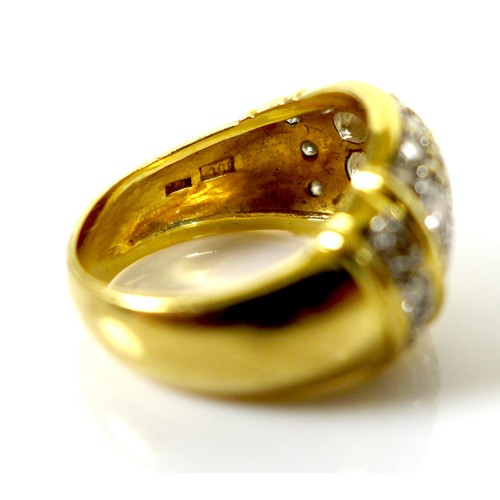 228 - A gold bombe cocktail ring, inset with some diamonds and other white stones, size J, indistinctly ma... 