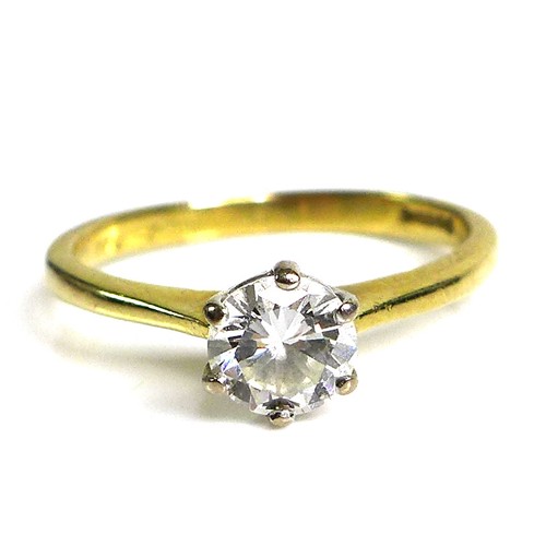 239 - An 18ct gold and diamond solitaire ring, the circular brilliants cut stone in claw mounts, 5.2 by 3.... 