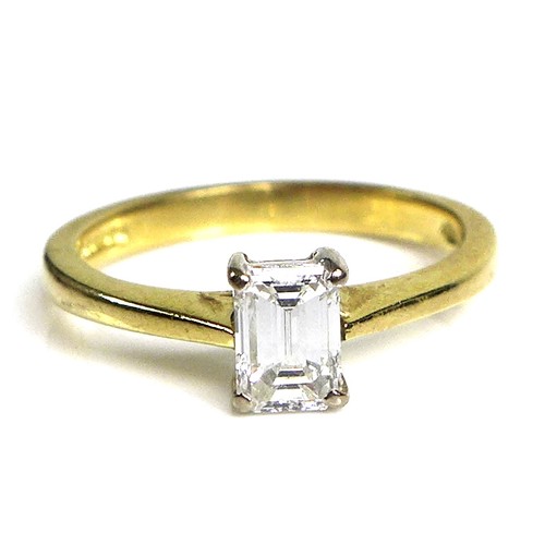 223 - An 18ct gold and diamond solitaire ring, the stone baguette cut in claw mounts, 3.5 by 4.8mm, 0.3ct,... 