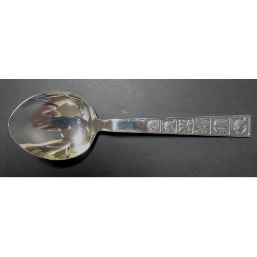 29 - A Norwegian Silver pair of salad servers, decorated with six heraldic emblems, circa 1966, David-And... 