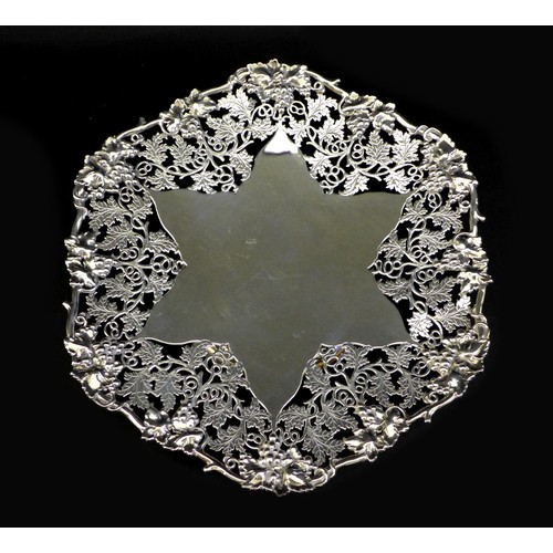 68 - A George VI silver pedestal dish, of hexagonal form, with elaborate pierced foliate borders, and a s... 