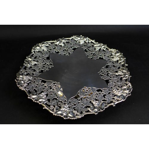 68 - A George VI silver pedestal dish, of hexagonal form, with elaborate pierced foliate borders, and a s... 