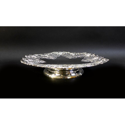 68 - A George VI silver pedestal dish, of hexagonal form, with elaborate pierced foliate borders, and a s... 