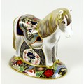 A Royal Crown Derby paperweight, modelled as 'Miniature Shetland Pony', limited edition 79/500 exclu... 