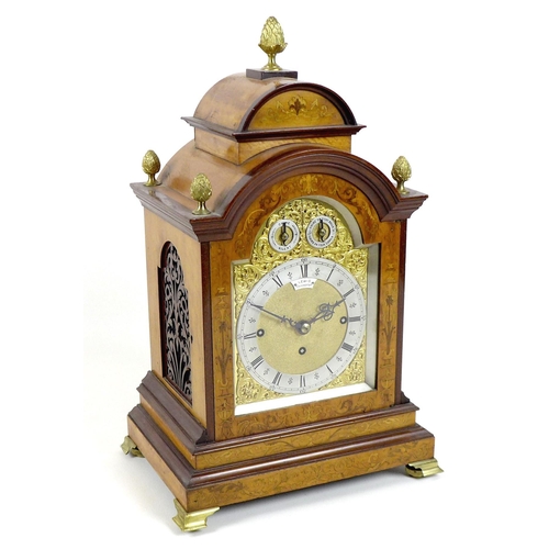 189 - A 19th century bracket clock, by Lewis of Chichester, with domed mahogany and satinwood veneered cas...