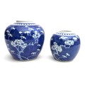 Two Chinese blue and white ceramic ginger jars, each decorated in underglaze blue with cherry blosso... 