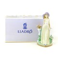 A Lladro figurine 'Time for Reflection', with maker's marks to base, 16 by 16.5 by 34.5cm high, with... 