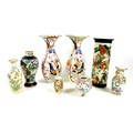A group of Chinese and Japanese vases, comprising a Chinese sleeve vase, early 20th century, decorat... 