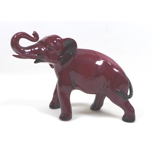 3 - A group of elephants figurines, including a Beswick 'Elephant - Trunk stretching - small', model 974... 