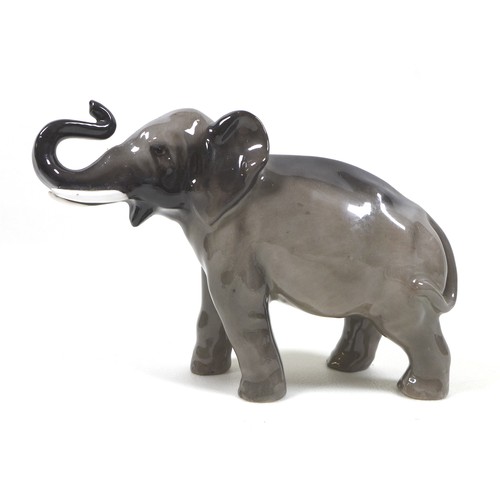 3 - A group of elephants figurines, including a Beswick 'Elephant - Trunk stretching - small', model 974... 