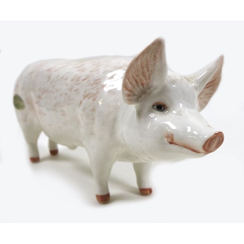 20 - A group of two pig figurines, comprising a Royal Doulton 'Vietnamese Pot-Bellied Piglet', model G213... 