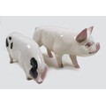 Two pig figurines, comprising a Beswick 'Middle white Boar', model 4117, white - gloss, 9.5cm high, ... 