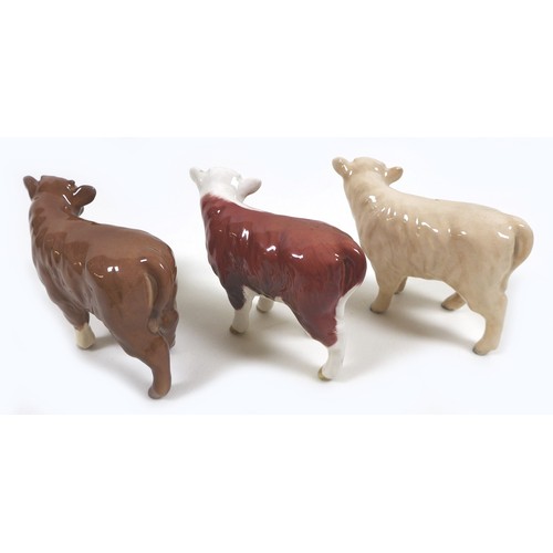 26 - A group of three Beswick calves, comprising a 'Limousin Calf', model 1827E, brown and white - gloss,... 