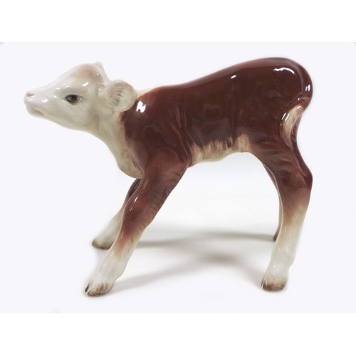 27 - Two Beswick calves, comprising a 'Hereford Calf', model 901B, Second Version - Mouth closed, brown a... 