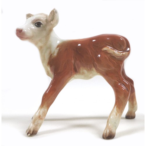 27 - Two Beswick calves, comprising a 'Hereford Calf', model 901B, Second Version - Mouth closed, brown a... 