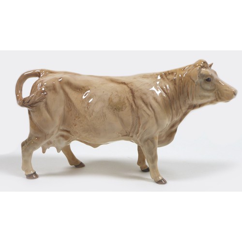 32 - A group of three Beswick cows, comprising a 'Hereford Cow 