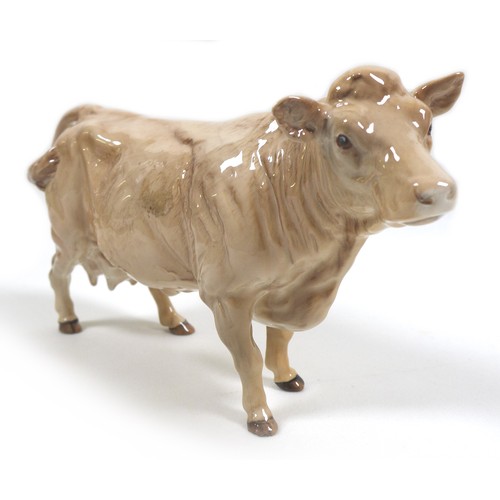 32 - A group of three Beswick cows, comprising a 'Hereford Cow 