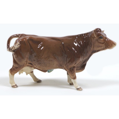 32 - A group of three Beswick cows, comprising a 'Hereford Cow 