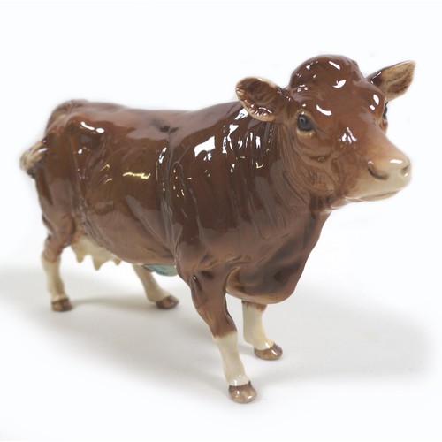 32 - A group of three Beswick cows, comprising a 'Hereford Cow 