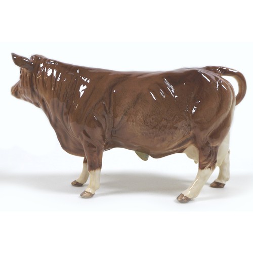 32 - A group of three Beswick cows, comprising a 'Hereford Cow 