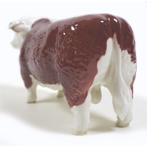 33 - Two Beswick cows, comprising a 'Hereford Cow 