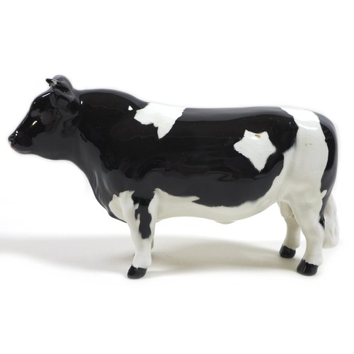 33 - Two Beswick cows, comprising a 'Hereford Cow 