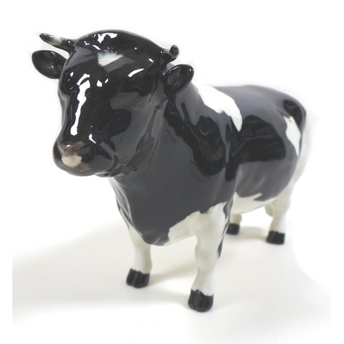 33 - Two Beswick cows, comprising a 'Hereford Cow 