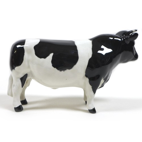 33 - Two Beswick cows, comprising a 'Hereford Cow 