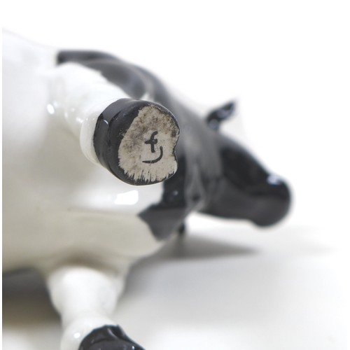 33 - Two Beswick cows, comprising a 'Hereford Cow 