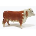 A Beswick 'Hereford Bull', model 949, red and white - gloss, 14.5cm high.