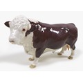 A Beswick 'Polled Hereford Bull', model 2549A, brown and white - gloss, ringed nose, 12.7cm high, wi... 