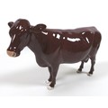 A Beswick 'Red Poll Cow', model 4111, red/brown - gloss, 16cm high, with box.