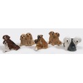 A group of five Beswick puppy duos, comprising 'Hounds - Seated', model 3375, black, tan and white -... 
