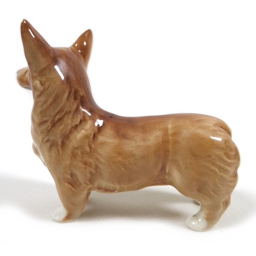 46 - A group of five Beswick dogs, comprising 'Labrador - Small', model 1956, black - gloss, 8.3cm high, ... 