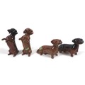 A group of four Beswick Dachshund figurines, comprising two 'Dachshund - Begging', model 1461, tan -... 