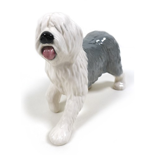 59 - A Beswick 'Old English Sheep Dog - Walking' figurine, model 3058, grey and white - gloss, 14cm high,... 