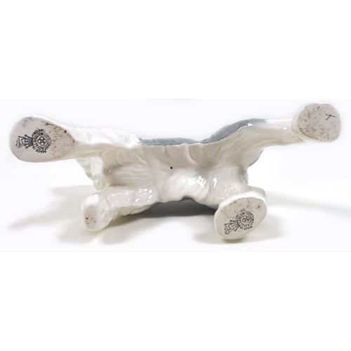 59 - A Beswick 'Old English Sheep Dog - Walking' figurine, model 3058, grey and white - gloss, 14cm high,... 