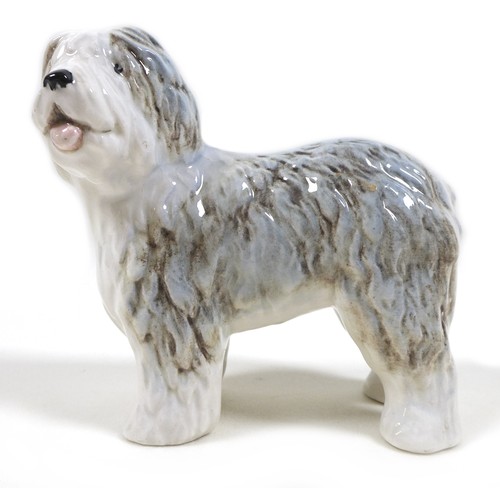 59 - A Beswick 'Old English Sheep Dog - Walking' figurine, model 3058, grey and white - gloss, 14cm high,... 