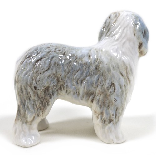 59 - A Beswick 'Old English Sheep Dog - Walking' figurine, model 3058, grey and white - gloss, 14cm high,... 