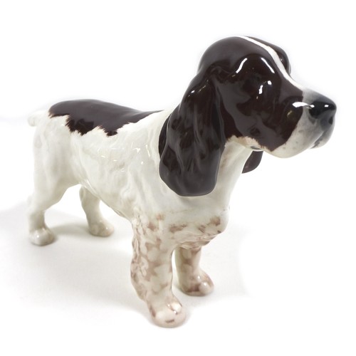 70 - A Beswick 'Poodle', model 2339, white - gloss, 14.6cm high, together with a 'Cocker Spaniel 