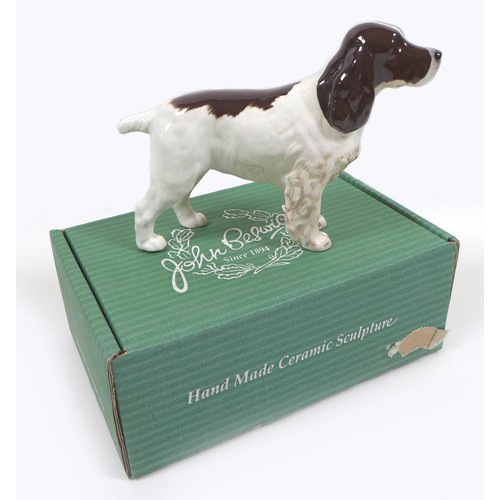 70 - A Beswick 'Poodle', model 2339, white - gloss, 14.6cm high, together with a 'Cocker Spaniel 