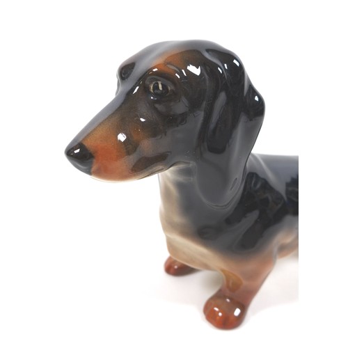 72 - A Beswick 'Dachshund - Standing', model 361, black and tan - gloss,  13.5cm high.